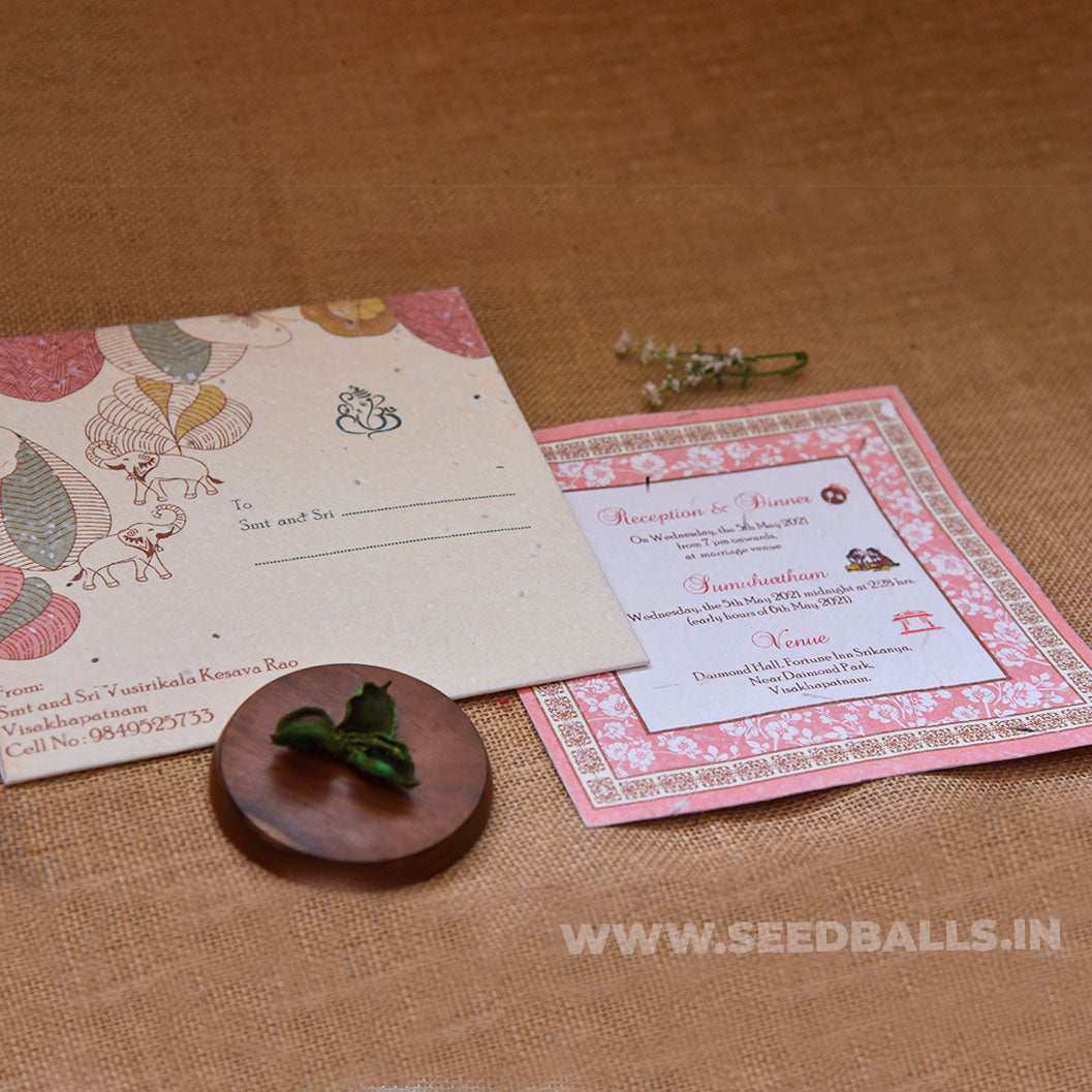 White and Pink Floral Invitation With Seeds
